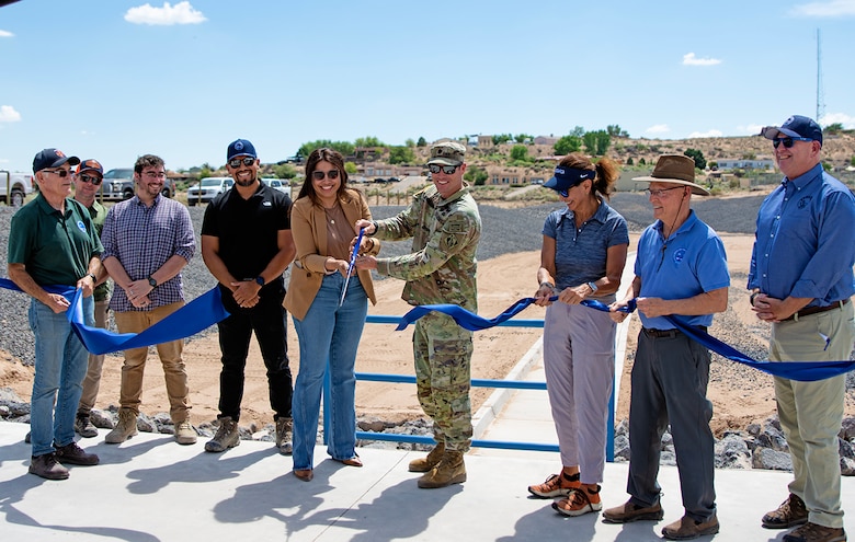 Lt. Col. Matthew Miller, 4th from right, commander, USACE-Albuquerque District, and Cindy Nava, New Mexico state senator (district 9) cut the ribbon on the Tortugas Arroyo Improvements Project, Aug. 25, 2025.  

(l-r): James Fahey, Jr., mayor, Village of Corrales, N.M.; Shane Meihaus, project manager, Compass Engineering; Andrew Petersen, project manager, USACE-Albuquerque District; Omar Lopez, HDR; Cindy Nava; Lt. Col. Matthew Miller; Bel Marquez, board of directors, SSCAFCA; Ron Abramshe, board of directors, SSCAFCA; and Dave Gatterman, executive engineer, SSCAFCA.