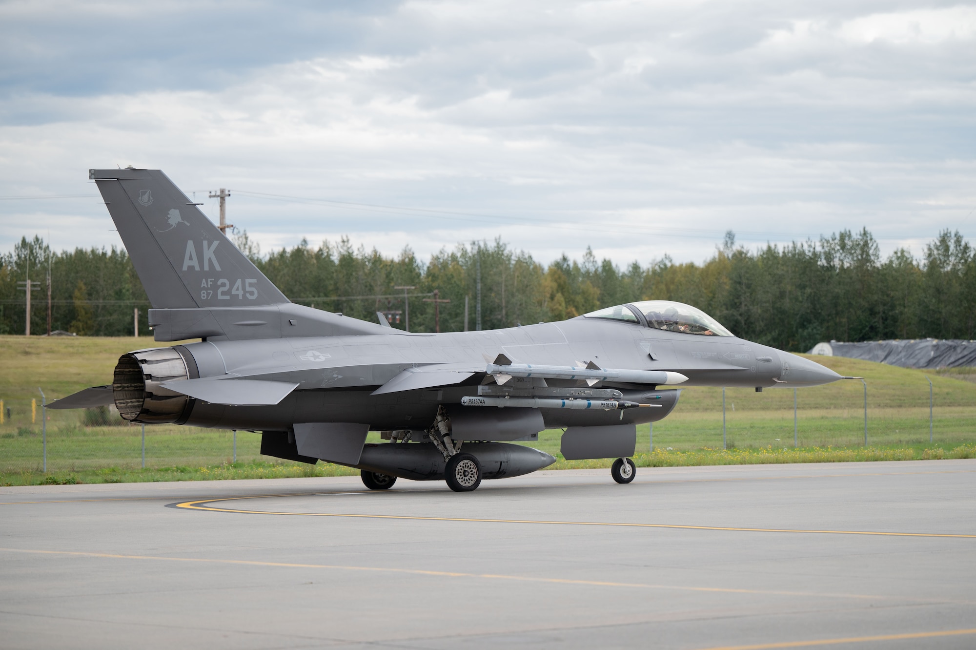 A U.S. Air Force F-16 Fighting Falcon assigned to the 18th Fighter Interceptor Squadron taxis at Eielson Air Force Base, Alaska, Aug. 25, 2025.