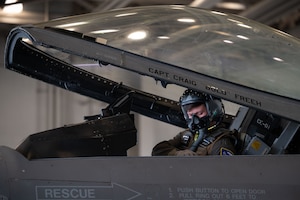 U.S. Air Force Capt. James Dickens, 18th Fighter Interceptor Squadron pilot and assistant director of operations, checks his gear in a F-16 Fighting Falcon at Eielson Air Force Base, Alaska, August 25, 2025.