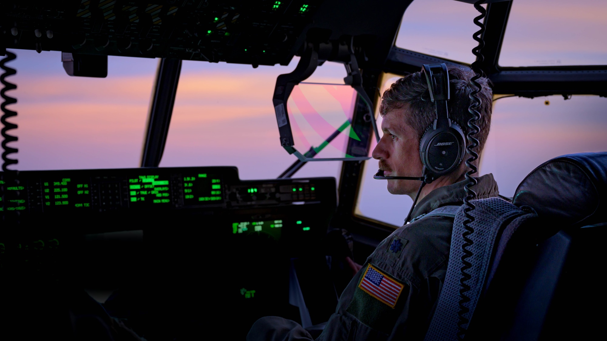 U.S. Air Force Lt. Col. Matthew Hamblen, Kentucky Air National Guard 165th Airlift Squadron pilot, flies a C-130J Super Hercules back to Yokota Air Base, Japan after a mass casualty training event in the Indo Pacific region, July 22, 2025. Airmen executed three high-intensity scenarios, a standard AE mission, a mid-flight mass casualty response, and a prolonged trauma care scenario aboard the aircraft.