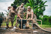 U.S. Army Soldiers from the 1970th Quartermaster Company, Illinois Army National Guard, start a water pump as part of the water treatment process during Super Garuda Shield 25 in Baturaja, Indonesia, Aug. 24, 2025.