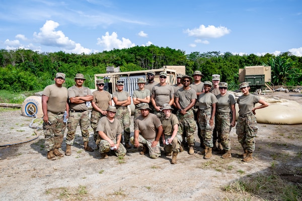 U.S. Army Soldiers from the 1970th Quartermaster Company, Illinois Army National Guard, pose for a group photo in front of their water treatment facility in Baturaja, Indonesia, Aug. 24, 2025.