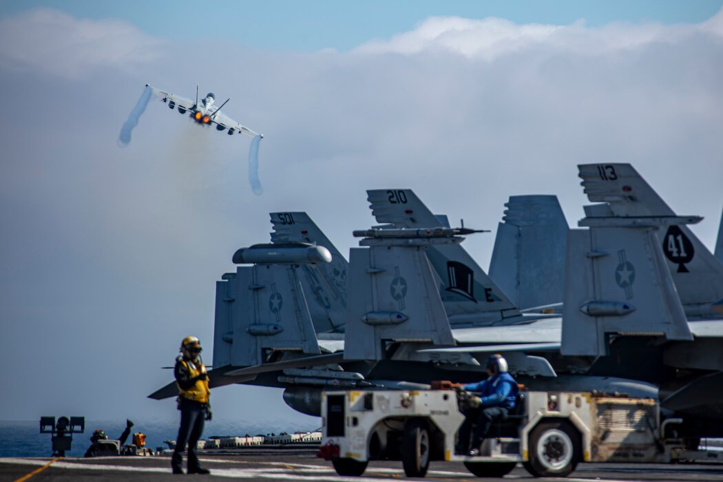 An F/A-18F Super Hornet, attached to Strike Fighter Squadron (VFA) 41, launches from the flight deck of the Nimitz-class aircraft carrier USS Abraham Lincoln (CVN 72) during Northern Edge 2025 (NE25).