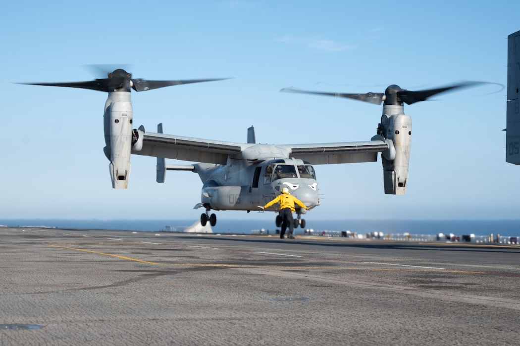 A U.S. Marine Corps MV-22B Osprey attached to Marine Tiltrotor Squadron Marine Tiltrotor Squadron (VMM) 163 (Reinforced), prepares to land on the flight deck of the Wasp-class amphibious assault ship USS Boxer (LHD 4) while conducting flight operations Aug. 20, 2025.