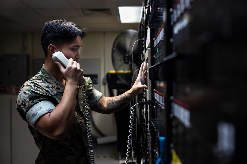 U.S. Marine Corps Cpl. Kevin Madriaga, an air traffic control communications technician, with Air Traffic Control Platoon completes a process called “turn ups” to ensure communications between aircraft and the tower are intact, at Marine Corps Air Station New River in Jacksonville, North Carolina, Aug. 25, 2025. Madriaga, the recipient of the August MCAS New River Go-Getter award, enlisted in March of 2022 from Sacramento, California. (U.S. Marine Corps photo by Sgt. Yvonna Guyette)