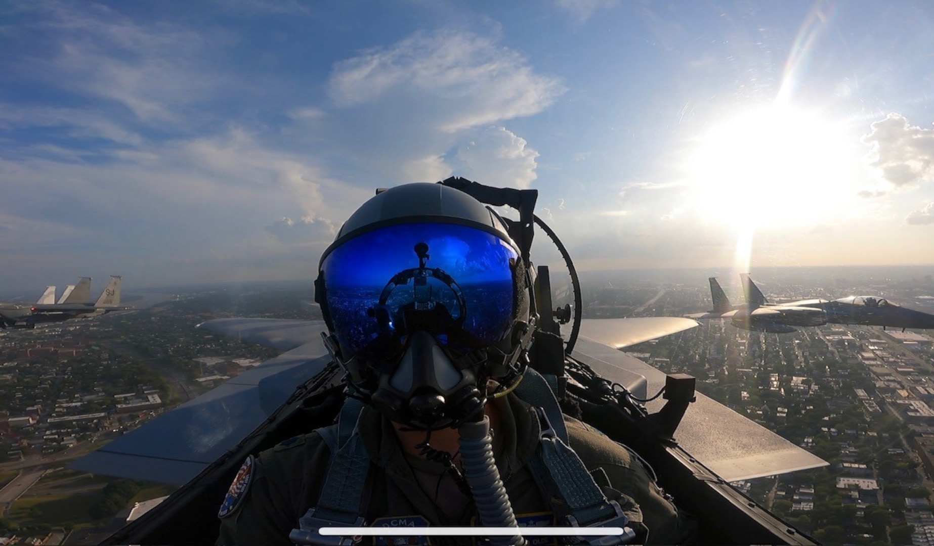 Pilot flies an F-15 in the sky