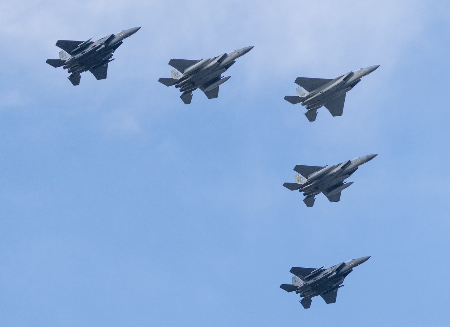 Five jets fly into the sky