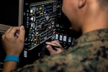 U.S. Marine Corps Cpl. Kevin Madriaga, an air traffic control communications technician, with Air Traffic Control Platoon poses for a photo at Marine Corps Air Station New River in Jacksonville, North Carolina, Aug. 25, 2025.