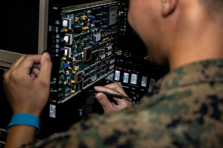 U.S. Marine Corps Cpl. Kevin Madriaga, an air traffic control communications technician, with Air Traffic Control Platoon poses for a photo at Marine Corps Air Station New River in Jacksonville, North Carolina, Aug. 25, 2025.