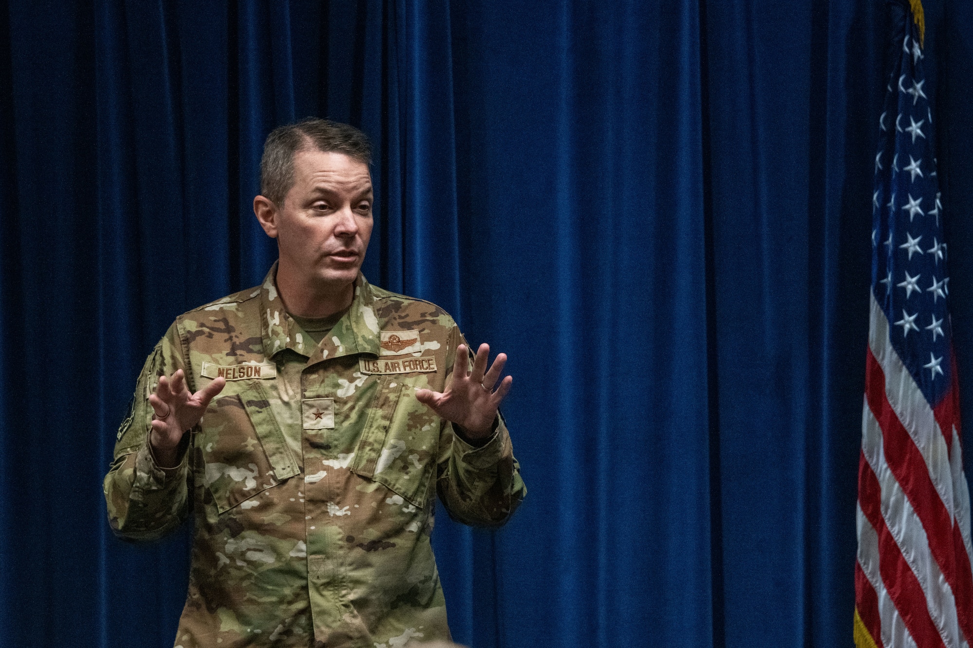 U.S. Air Force Brig. Gen. Jeffrey W. Nelson, commander of the Air Force Accessions Center and Air Force Recruiting Service at Joint Base San Antonio-Randolph, Texas, speaks to warrant officer candidates during a Warrant Officer Training School immersion tour at Maxwell Air Force Base, Alabama, Aug. 20, 2025.