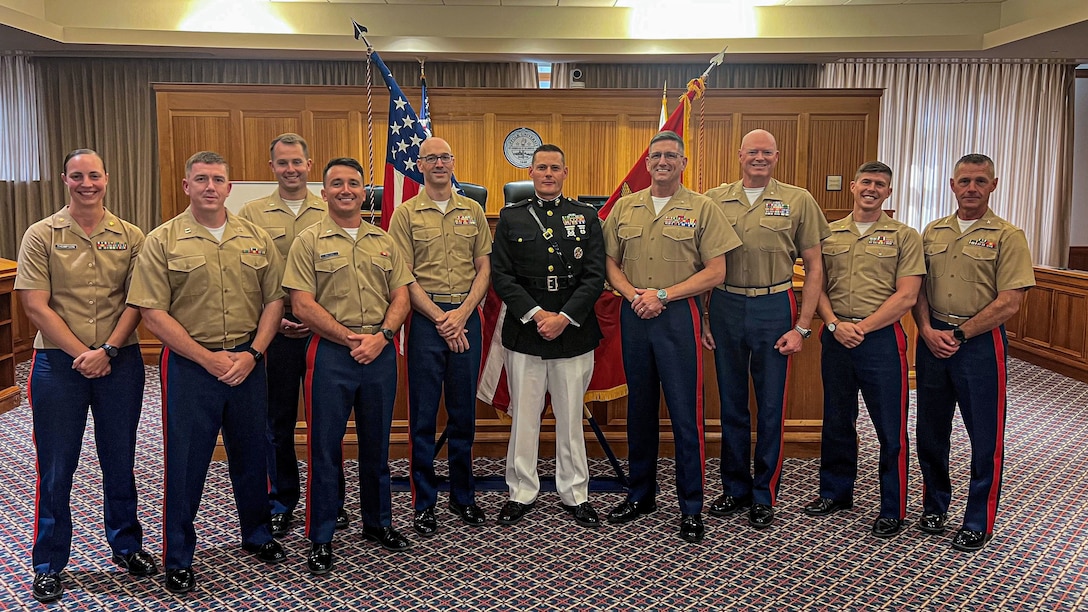 From left to right, Maj. Courtney Thompson, commanding officer, Recruiting Station Boston, 1st Marine Corps District, Capt. Tyler Pittman, military justice instructor, Naval Justice School, 1st Lt. Nicolas Labranche, a judge advocate with Marine Corps Base Camp Pendleton, 1st Lt. Miles Matule, a judge advocate with the Eastern Recruiting Region, Lt. Col. Brad Tully, deputy judge advocate, Headquarters and Service Battalion, Marine Corps Recruit Depot, Parris Island, S.C., Capt. Connor Flynn, officer selection officer, Recruiting Station Boston, Col. Iain Pedden, a judge advocate and Director of Appellate Government Division, Navy and Marine Corps Criminal Court of Appeals, Col. Alexander Chotkowski, staff judge advocate, Marine Forces Command Headquarters, Maj. Lambert Jackson, deputy staff judge advocate, Judge Advocate Division of Headquarters Marine Corps, and Col. James Gallagher, judge advocate, Marine Forces Command, facilitated the 2025 Boston Marine Corps Judge Advocate Symposium at Suffolk University Law School during Marine Week Boston, Aug. 25, 2025. The symposium took place on the first day of classes for the 2025-2026 academic year and was attended by law students, alumni and faculty members from law programs at Suffolk University, New England Law, Boston College, University of New Hampshire, Yale and Harvard. These Marine Officers showcased their experience and opportunities for service in the Marine Corps to law students and the Boston legal community. (Courtesy Photo)