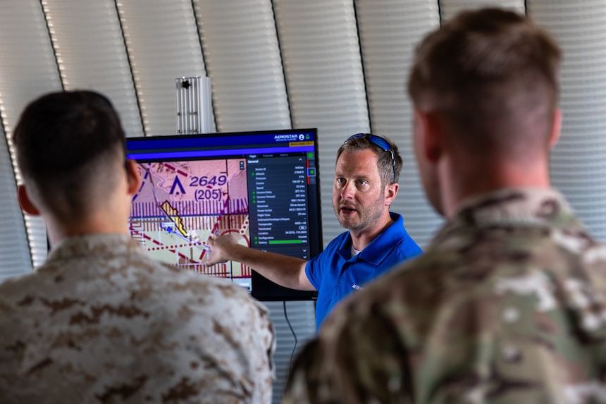 Mark Ketcham, Aerostar, provides warfighter feedback to Marines who attended a technical demonstration held at Outlying Landing Field Seagle in Twentynine Palms, Calif. May 19-21, 2025. The U.S. Naval Research Laboratory in conjunction with the Operational Energy Capability Improvement Fund with the Office of the Assistant Secretary of Defense for Energy, Installations, and Environment, and the Marine Corps Expeditionary Energy Office (E2O)  conducted the demonstration aiming to develop a technology for Navy vessels to "see over the horizon" using a combination of stratospheric high-altitude balloons (HABs) and unmanned aircraft.  (U.S. Marine Corps photo by Pfc. Jozef Mejewski/Released)