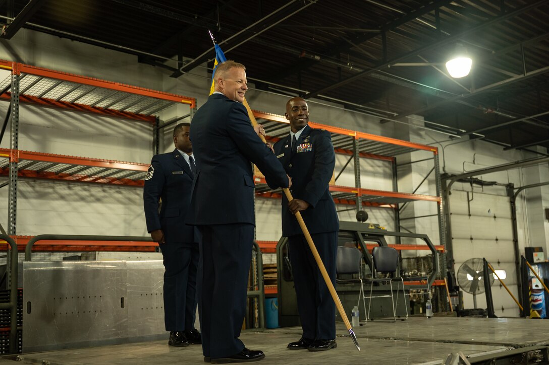 Maj. Astin Moore, the newest commander of the 30th Aerial Port Squadron, assumes command during an official ceremony at Niagara Falls Air Reserve Station, New York, Aug 2, 2025.