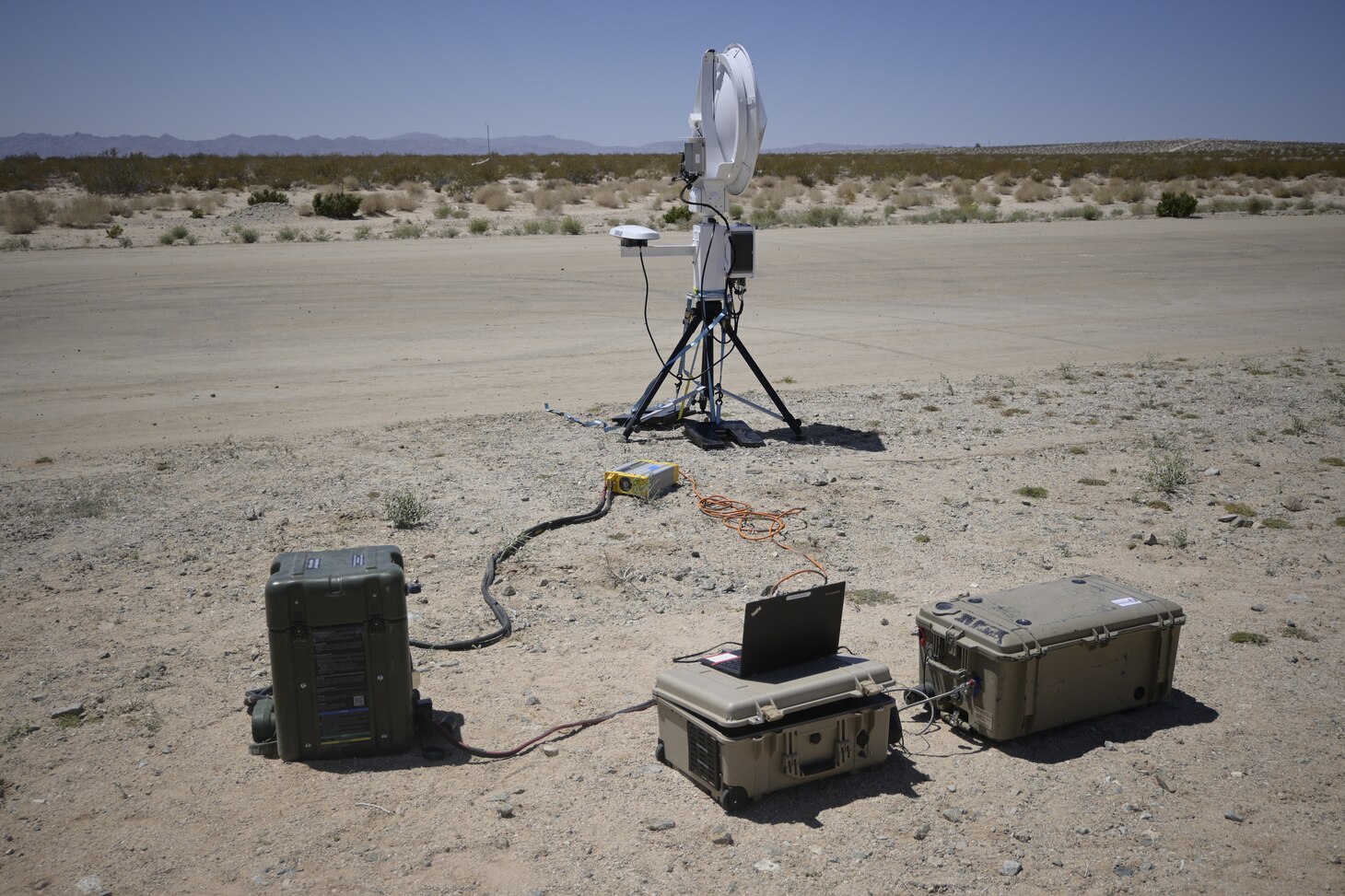 Featured is an Aerostar High Altitude Balloon (HAB) ground station powered by a Hydrogen Small Unit Power (H-SUP) system using a hydrogen fuel cell during a technical demonstration held at Outlying Landing Field Seagle in Twentynine Palms, Calif. May 19-21, 2025 The U.S. Naval Research Laboratory in conjunction with the Operational Energy Capability Improvement Fund with the Office of the Assistant Secretary of Defense for Energy, Installations, and Environment, and the Marine Corps Expeditionary Energy Office (E2O) conducted the demonstration aiming to develop a technology for Navy vessels to "see over the horizon" using a combination of stratospheric high-altitude balloons (HABs) and unmanned aircraft.  (Photo by Christopher Fischelli)