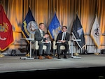 Brandon Pugh, left, Principal Cyber Advisor to the Secretary of the Army, spoke in a fireside chat at TechNet Augusta 2025 to discuss the leveraging of cyber capabilities, AI, and public-private partnerships to modernize the force, enhance expeditionary cyber operations, and defend critical infrastructure. The Army is undergoing a once in a generation transformation to meet the threat of the modern and future battlefield. (Courtesy photo)