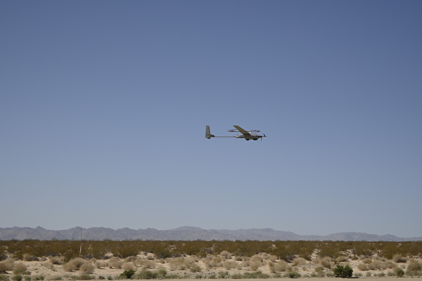 A Stalker unmanned air system (UAS) takes off during a technical demonstration held at Outlying Landing Field Seagle in Twentynine Palms, Calif. May 19-21, 2025. The U.S. Naval Research Laboratory in conjunction with the Operational Energy Capability Improvement Fund with the Office of the Assistant Secretary of Defense for Energy, Installations, and Environment, and the Marine Corps Expeditionary Energy Office (E2O) conducted the demonstration aiming to develop a technology for Navy vessels to "see over the horizon" using a combination of stratospheric high-altitude balloons (HABs) and unmanned aircraft.  (Photo by Christopher Fischelli)