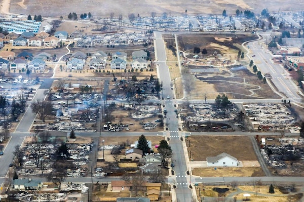 Aerial shot of wildfire destruction in Colorado.