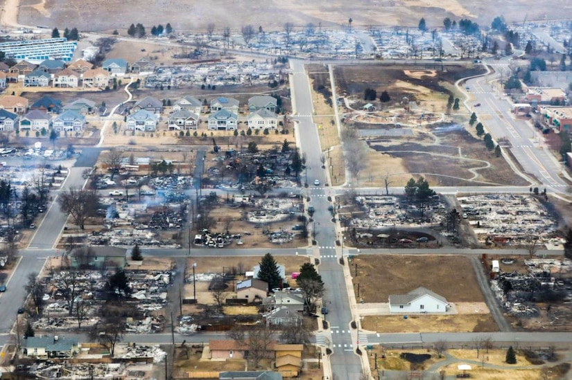 Aerial shot of wildfire destruction in Colorado.