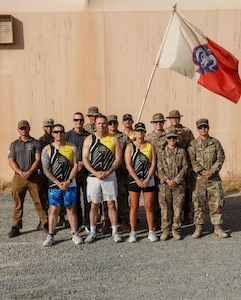 Members of the 17th Sustainment Brigade, Nevada Army National Guard, pose for a photo during their running of the Reno Tahoe Odyssey while deployed in the Middle East earlier this year.