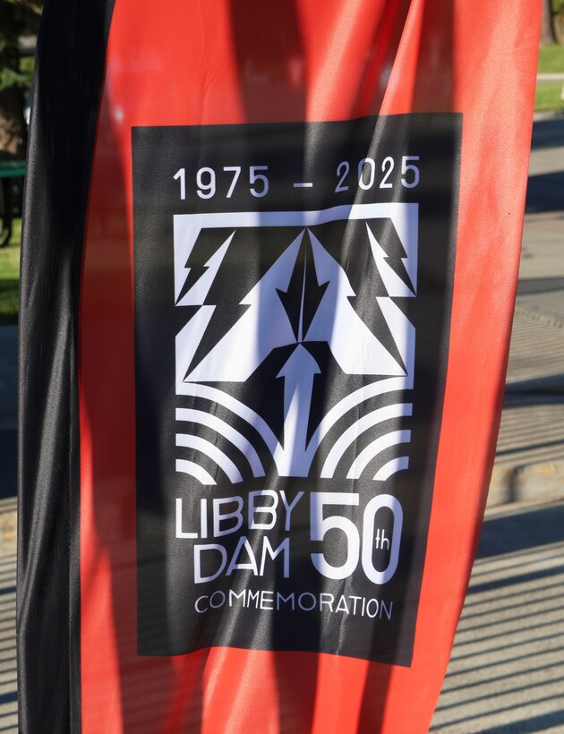A banner flag displays the official 50th commemoration logo designed by Graphic Designer Adrian Volz. Volz's design was chosen among several entries submitted as part of the dam's logo contest that ran from November 2024 to January 2025. The logo was showcased on all communication products, including official public website, social media, commemoration memorabilia and other products.