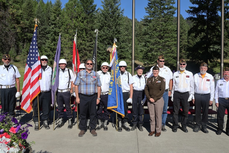 U.S. Army Corps of Engineers, Seattle District Commander Col. Kathryn Sanborn, Libby Dam Operating Project Manager Rick Spiger and members of the VFW and American Legion who presented the Colors and performed Taps, during the memorial unveiling, as part of Libby Dam's 50th commemoration, Aug. 23, 2025, at Libby, Montana.