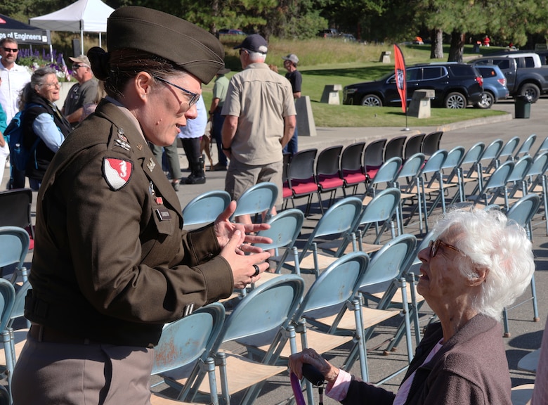 U.S. Army Corps of Engineers, Seattle District Commander Col. Kathryn Sanborn chats with Mrs. Millie Cole, widow of Phil Cole, the resident engineer at Libby Dam during its construction. Mrs. Cole was a special guest of USACE for Libby Dam's 50th commemoration, Aug 23, 2025.