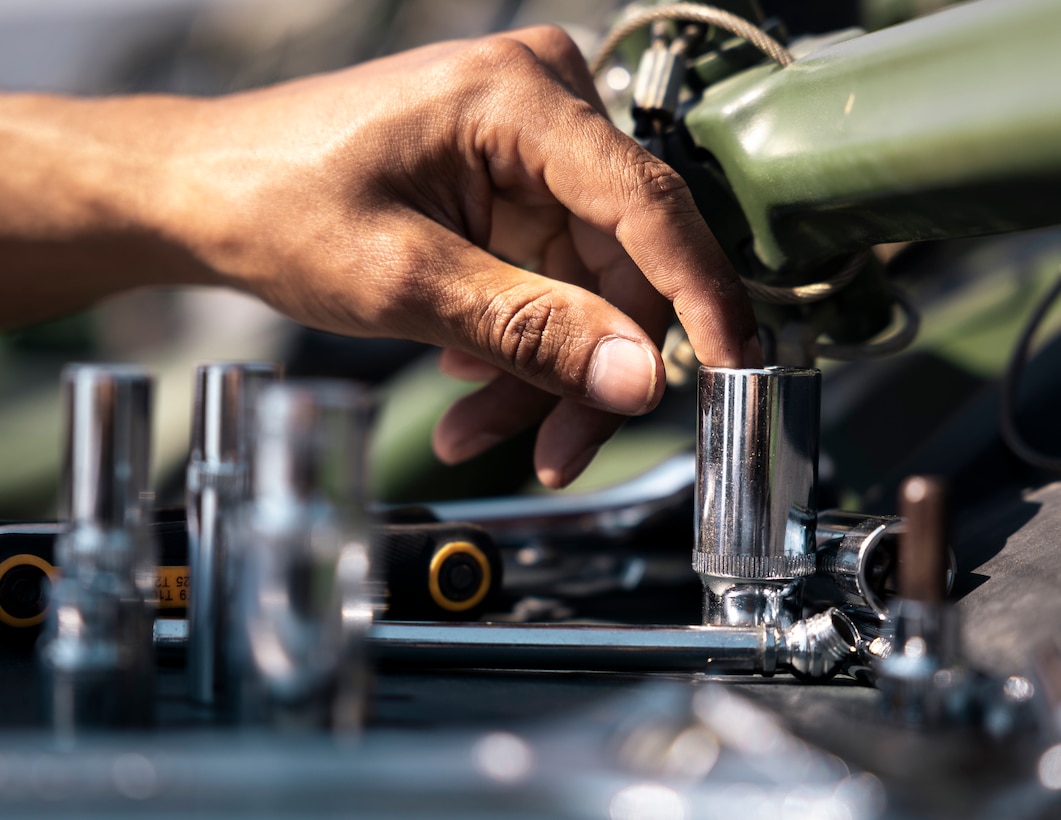 U.S. Marine Corps Lance Cpl. Diego Resendez, an automotive maintenance technician with I Marine Expeditionary Force Support Battalion, I MEF Information Group, I MEF, inspects tactical vehicle equipment on Marine Corps Base Camp Pendleton, California, Aug. 6, 2025, to ensure its complete, safe to operate and capable of performing its designated primary combat function during future operations. (U.S. Marine Corps photo by Cpl. Joseph Helms)