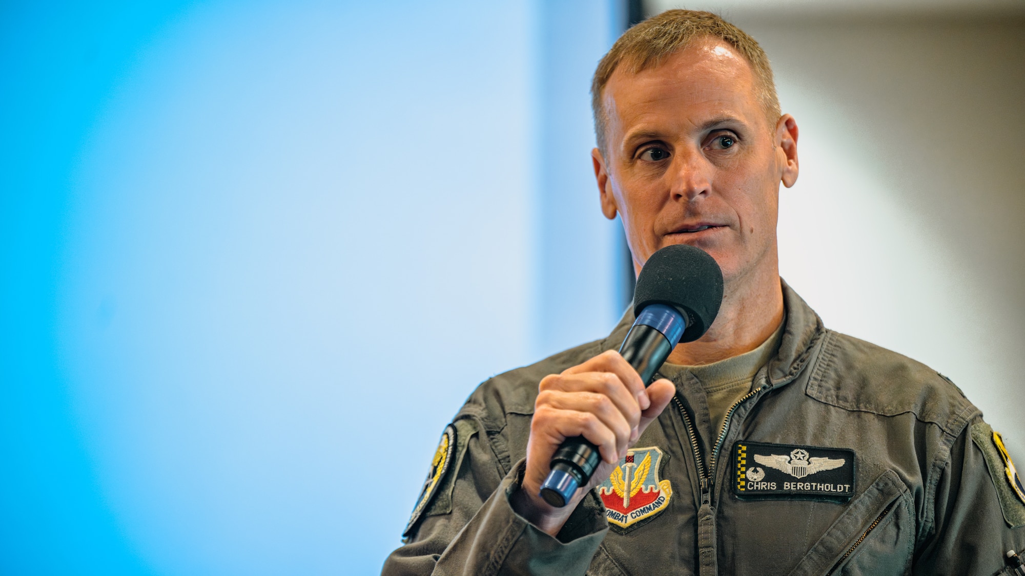 The 325th Fighter Wing commander giving a brief during an All Call