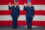 U.S. Air Force Airman 1st Class Atson Nameta, 2nd Logistics Readiness Squadron individual protection equipment apprentice, and Airman 1st Class Tykhon Rudenok, 2nd Civil Engineer Squadron heating, ventilation and air conditioning apprentice, take the Oath of Allegiance during a Naturalization Ceremony at Barksdale Air Force Base, Louisiana, July 15, 2025. A Naturalization Ceremony is a formal event where non-citizen U.S. service members officially become U.S. citizens through the naturalization process due to their military service. (U.S. Air Force photo by Airman 1st Class Jaiyah Lewis)