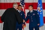 Honorable Judge Mark Hornsby, shakes the hands of U.S. Air Force Airman 1st Class Atson Nameta, 2nd Logistics Readiness Squadron individual protection equipment apprentice, and Airman 1st Class Tykhon Rudenok, 2nd Civil Engineer Squadron heating, ventilation and air conditioning apprentice, after administering the Oath of Allegiance during a Naturalization Ceremony at Barksdale Air Force Base, Louisiana, July 15, 2025. Hornsby, who administered the Oath of Allegiance, is the U.S. Magistrate for the Western District of Louisiana. (U.S. Air Force photo by Airman 1st Class Jaiyah Lewis)