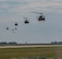 A formation of UH-1N Iroquois helicopters fly over Minot Air Force Base, North Dakota, Aug. 21, 2025. The primary missions of the UH-1N Iroquois include airlifting emergency security forces, providing security and surveillance of off-base nuclear weapons convoys and conducting medical evacuation. (U.S. Air Force photo by Senior Airman Alyssa Bankston)