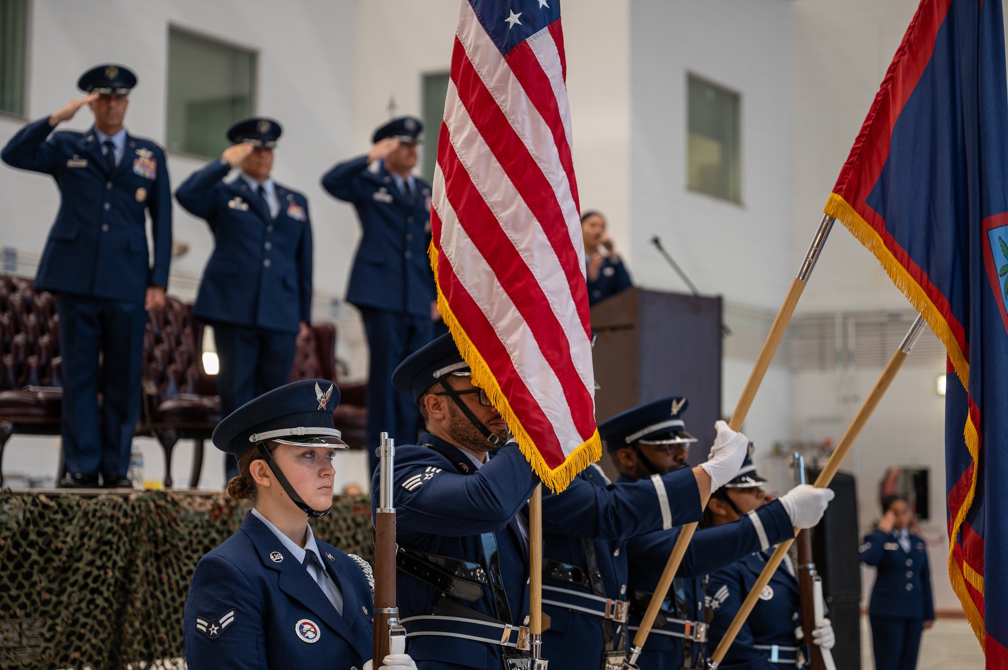 The Base Honor Guard from Andersen Air Force Base present colors during a change of command ceremony.