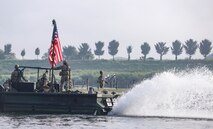 U.S. Army Soldiers assigned to the 11th Engineer Battalion, 2d Infantry Division Sustainment Brigade, 2d Infantry Division/ROK-U.S. Combined Division pull security on a bridge erecting boat during combined wet gap crossing training as part of Ulchi Freedom Shield near Yeoju, South Korea, Aug 27, 2025.