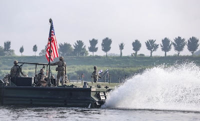 GYEONGGIDO [KYONGGI-DO], South Korea (Aug. 27, 2025) — U.S. Army Soldiers assigned to the 11th Engineer Battalion, 2d Infantry Division Sustainment Brigade, 2d Infantry Division/ROK-U.S. Combined Division pull security on a bridge erecting boat...