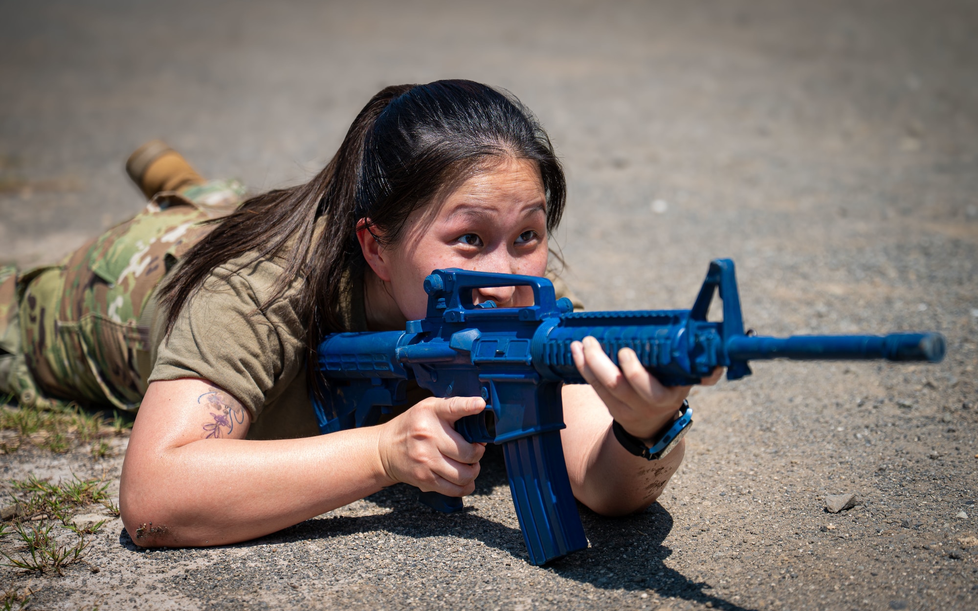 Airman does weapon training.