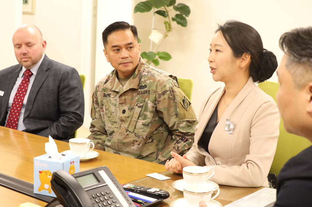 Lt. Col. Jason A. Supnet, military deputy chief of contracting for the U.S. Army Corps of Engineers – Far East District, listens as Jisun Kang, chief of contracting, speak with industry partners during the district’s first-ever Joint Industry Day, April 9, 2025. Supnet, recently named the 2025 USACE 51C Commissioned Officer of the Year, played a key role in co-hosting the event to build vendor relationships and strengthen bilateral cooperation. (U.S. Army photo by Monique Freemon)
