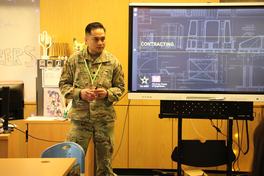 Lt. Col. Jason A. Supnet, military deputy chief of contracting with the U.S. Army Corps of Engineers – Far East District, speaks to students during a Science, Technology, Engineering, Arts and Mathematics (STEAM) outreach event at Humphreys High School, Feb. 21, 2025. Supnet, recently recognized as the 2025 USACE 51C Commissioned Officer of the Year, shared the role of contracting in USACE and offered insights from his Army career to inspire future leaders. (U.S. Army photo by Yohan An)