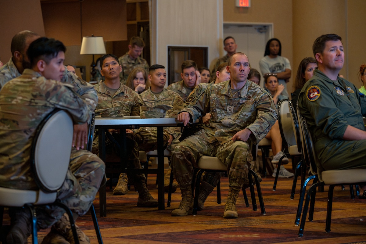 Attendees listen to panel members speak during a 35th Fighter Wing (FW) open forum town hall at Misawa Air Base, Japan, Aug. 27, 2025.
