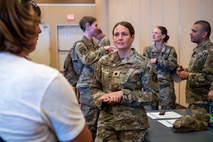 Members of the 35th Medical Group answer questions from attendees during a 35th Fighter Wing (FW) open forum town hall at Misawa Air Base, Japan, Aug. 27, 2025.