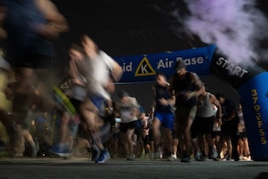 Participants begin a color run within the U.S. Central Command area of responsibility, Aug. 26, 2025. The event brought together base personnel for a high-energy celebration of fitness, camaraderie and colorful chaos. (U.S. Air Force photo by Senior Airman Dieondiere Jefferies)