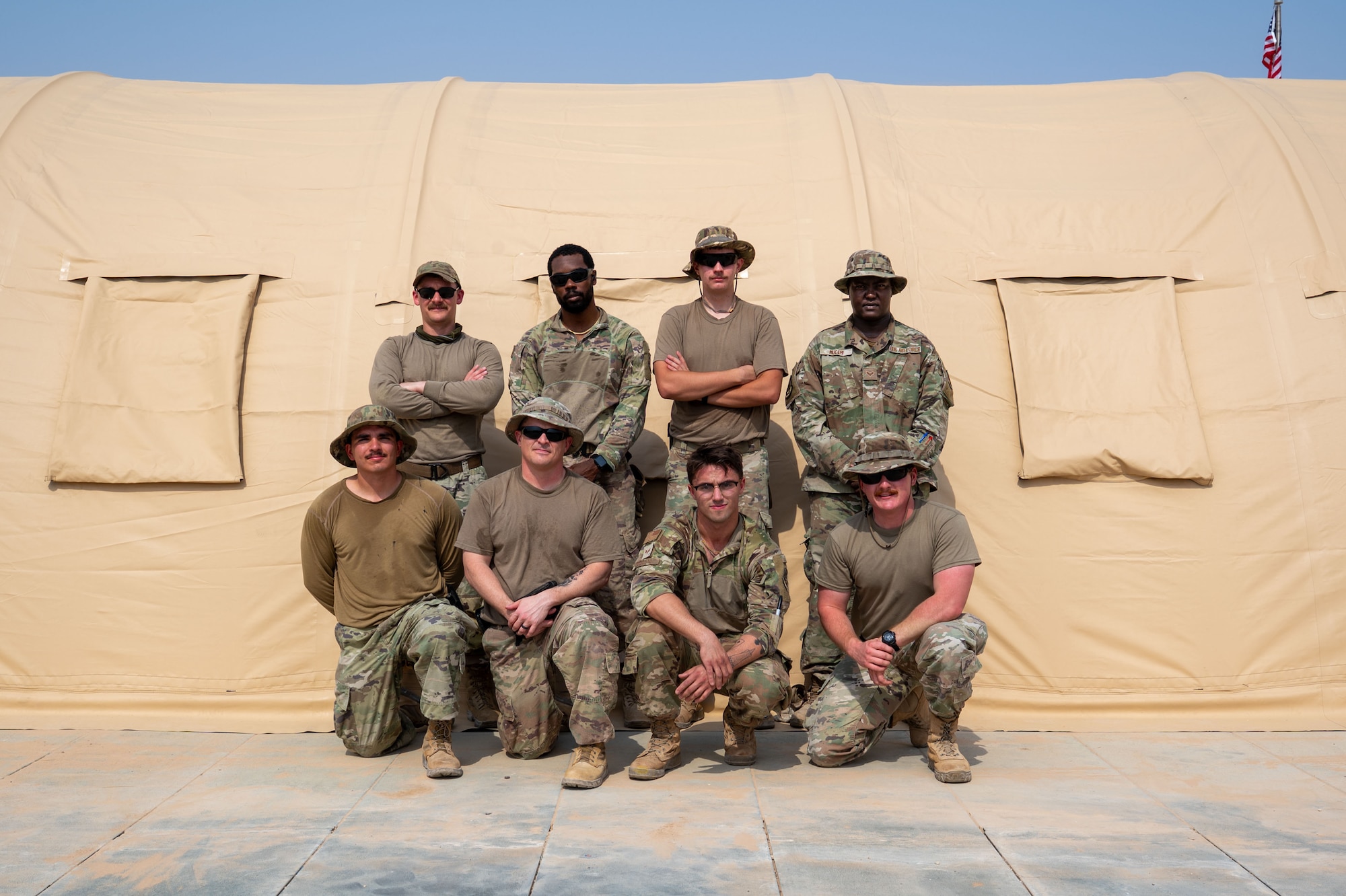 Airmen pose for group photo.