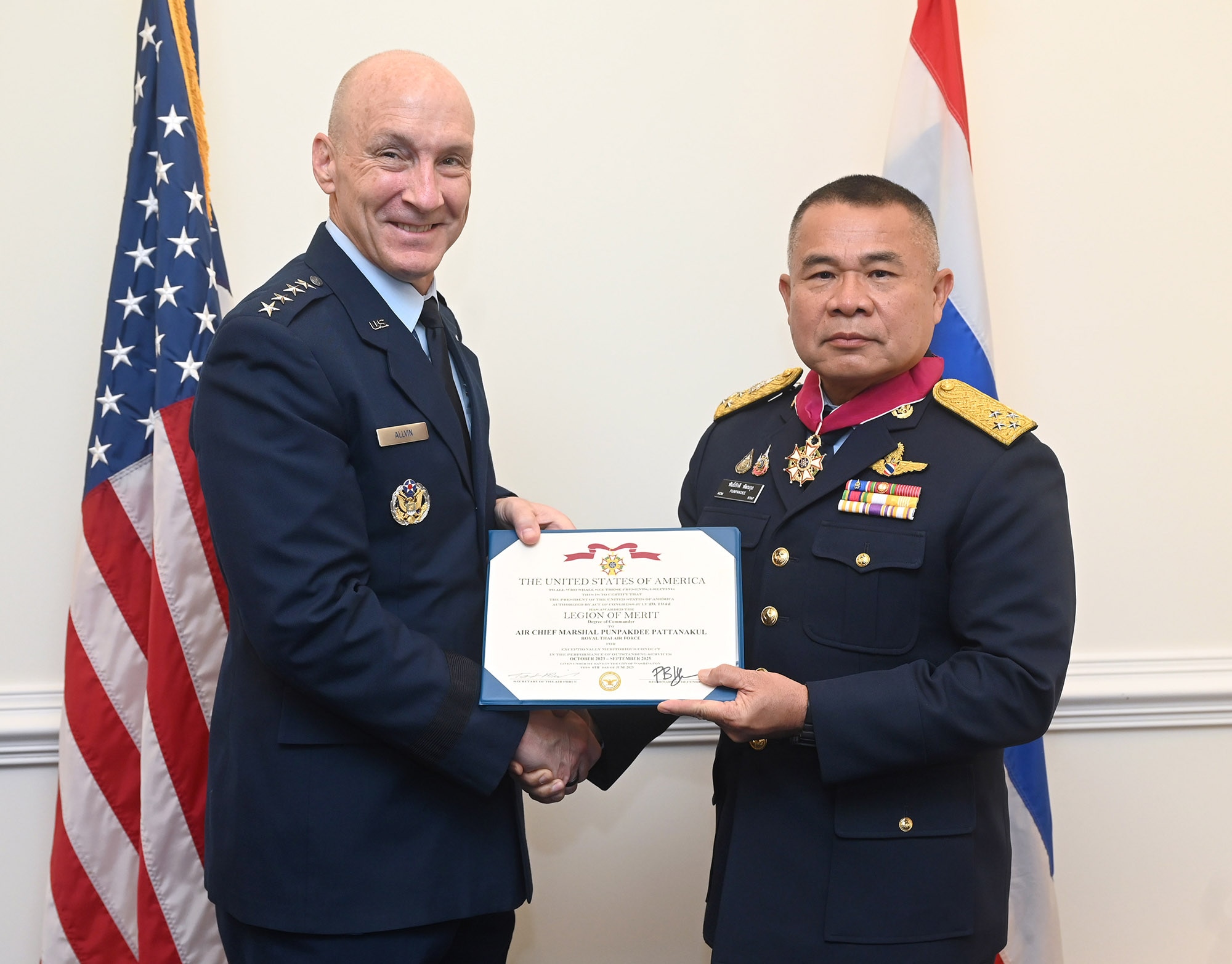 Air Force Chief of Staff Gen. David Allvin presents the Legion of Merit to Royal Thai Air Force Air Chief Marshal Punpakdee Pattanakul in the Pentagon, Arlington, Va., Aug. 20, 2025. (U.S. Air Force photo by Andy Morataya)