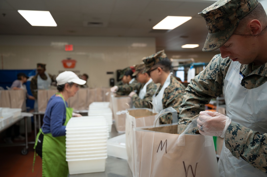 U.S. Marines assigned to Special Purpose Marine Air-Ground Task Force-250, prepare to package food at Community Servings, a non-profit organization that delivers meals to food-insecure homes in the city, during Marine Week Boston, Aug. 22, 2025. Marines stationed across the globe commemorate the 250th anniversary of the Marine Corps, honoring a distinguished legacy of service, sacrifice, and unwavering fidelity to both the nation and fellow Marines. (U.S. Marine Corps video by LCpl. Matthew McDonnell)