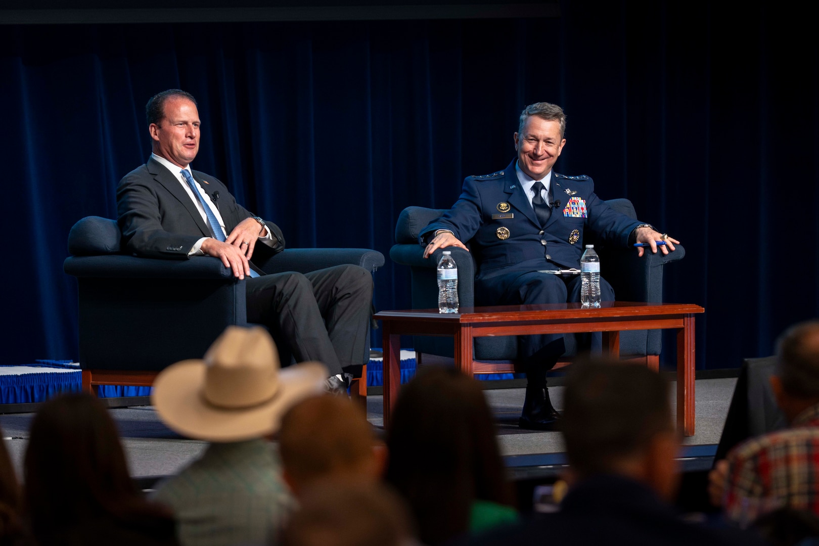 Chairman of the Joint Chiefs of Staff Gen. Dan Caine participates in a fireside chat with Congressman August Pfluger at the West Texas Legislative Summit in San Angelo, Tx.,  July 29, 2025. (DOD photo by Chief Mass Communication Specialist James Mullen)