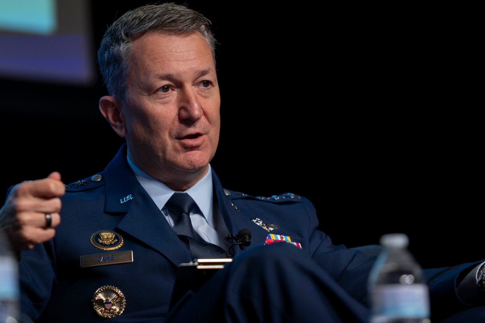 Chairman of the Joint Chiefs of Staff Gen. Dan Caine participates in a fireside chat with Congressman August Pfluger at the West Texas Legislative Summit in San Angelo, Tx.,  July 29, 2025. (DOD photo by Chief Mass Communication Specialist James Mullen)