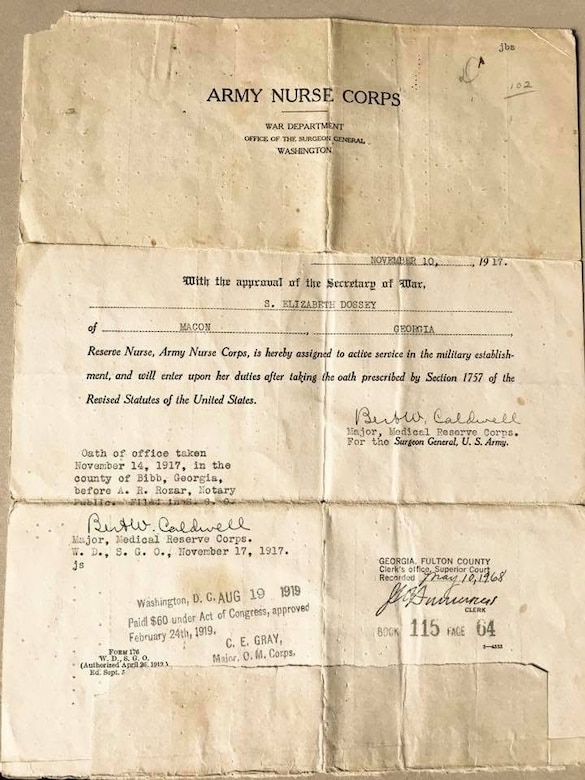 An old piece of paper is shown with both typed and handwritten writing on it.