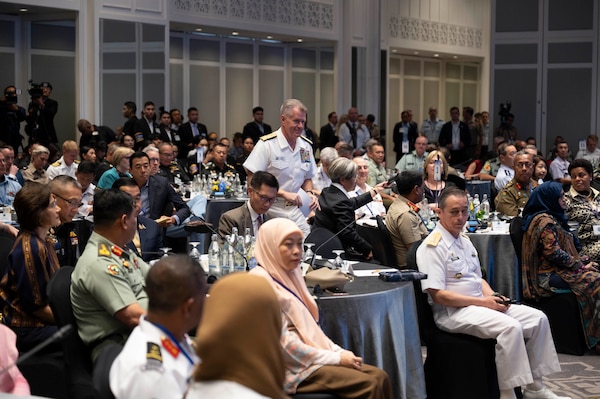 Adm. Samuel J. Paparo, commander of U.S. Indo-Pacific Command, prepares to take the stage for remarks at a Chiefs of Defense Conference in Hua Hin, Thailand, Aug. 27, 2025.