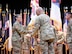 – Lt. Gen. Johnny Davis, commanding general U.S. Army Recruiting Command passes the Recruiting colors to Brig. Gen. Sara Dudley symbolizing the assumption of command for the newly-designated U.S. Army Recruiting Division during a ceremony at Waybur Theater, Fort Knox, Ky. Dudley was joined by Command Sgt. Maj Danny Basham, who assumed responsibility of USARD.