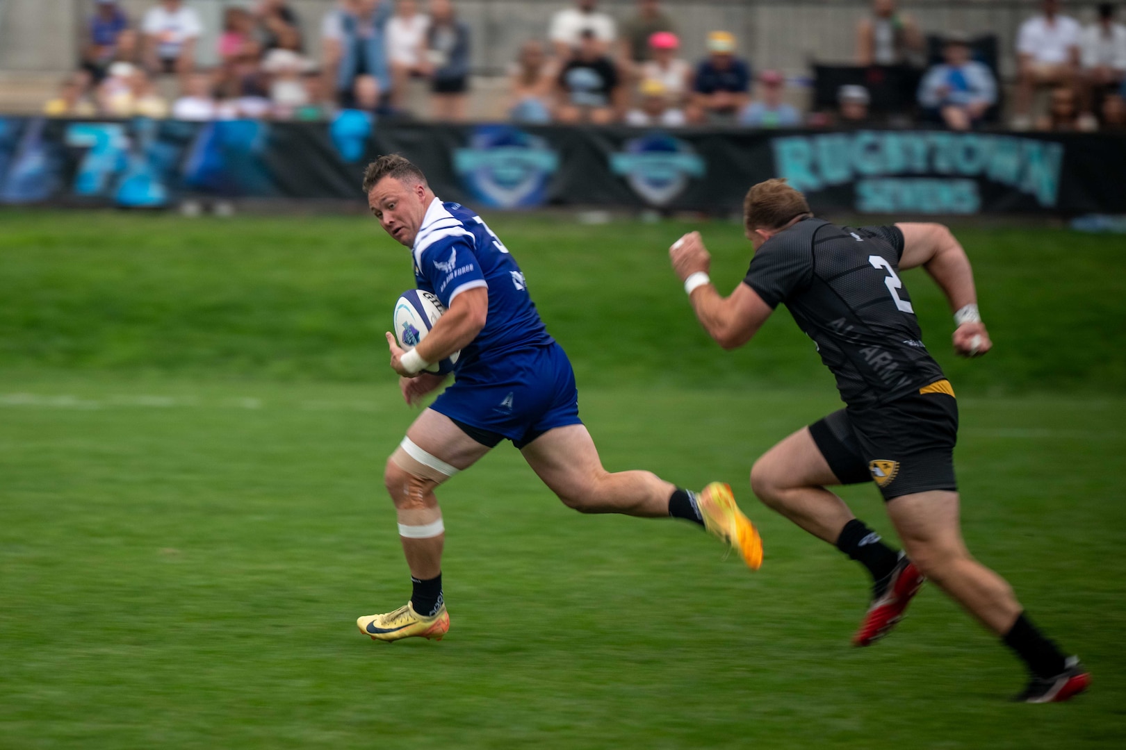 Air Force player runs for the score during the 2025 Armed Forces Men’s 7s Championship at Infinity Park in Glendale, Co. Armed Forces Sports fosters goodwill by promoting physical fitness, providing competitive opportunities for military athletes at national and international levels, enhancing recruitment and retention through sports diplomacy, and building strategic partnerships with allied nations. (U.S. Department of Defense photo by Mass Communication Specialist 2nd Class Theodore C. Lee)