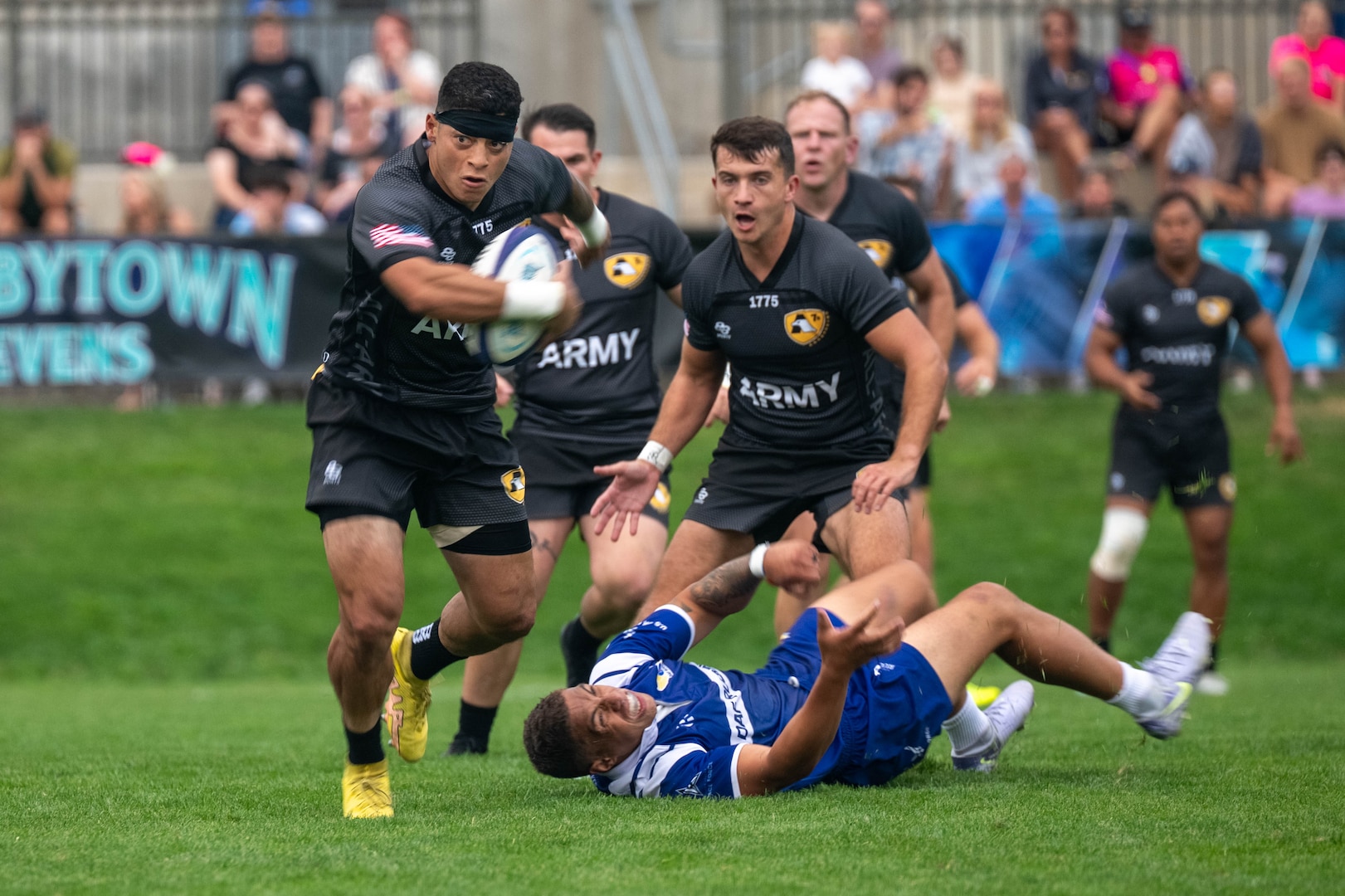 The 2025 Armed Forces Men’s Rugby Championships held in conjunction with Rugbytown 7’s Tournament in Glendale, Colo. from August 22-24. Service members from the Army, Marine Corps, Navy, Air Force (with Space Force players), and Coast Guard battle it out for gold.  (Photo by Petty Officer 2nd Class Theodore Lee)
